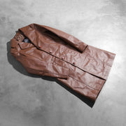 
Open Hem & Hem Craftsmanship Construction Detail on Alice Marron Double Breasted Manteau en Cuir pour Femme