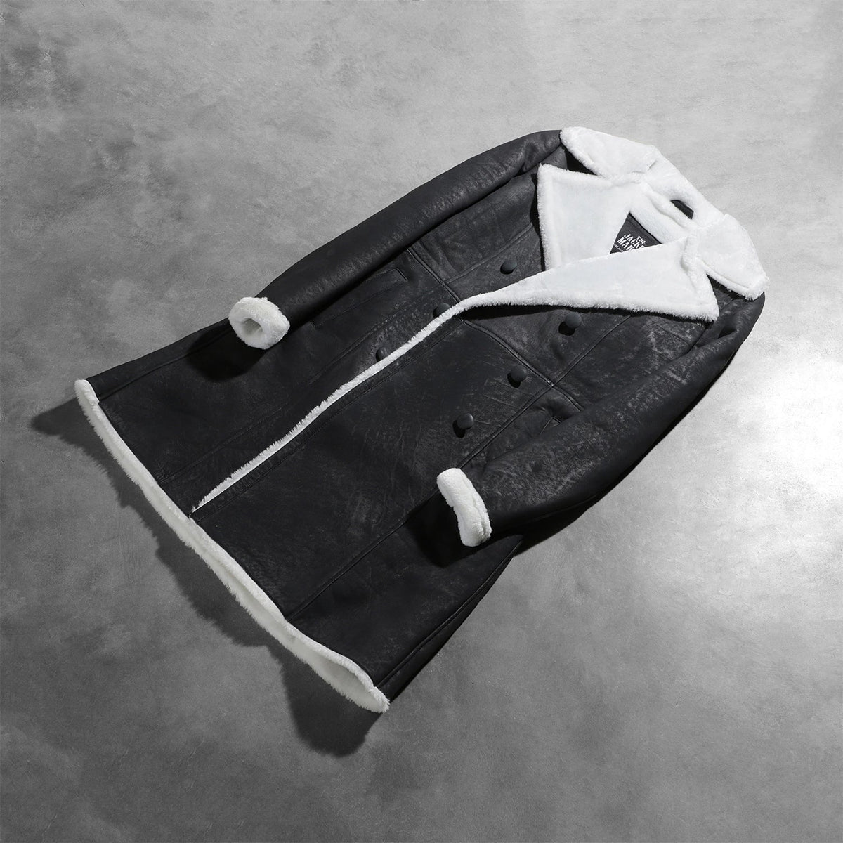 Open Hem &amp; Hem Craftsmanship Construction Detail on Women's Amie Black Double Breasted Shearling Coat