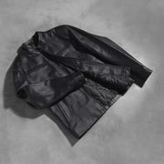 Styled Fit Perspective of Austere Matte Noir Veste Motard en Cuir pour Homme on Model - Natural Daylight Drape