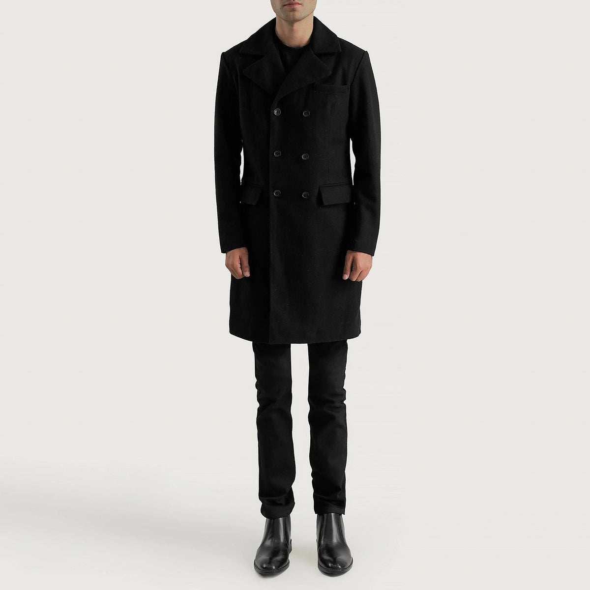 
Claud Black Wool Double Breasted Coat - Vue de profil mettant en valeur la coupe de manche ergonomique