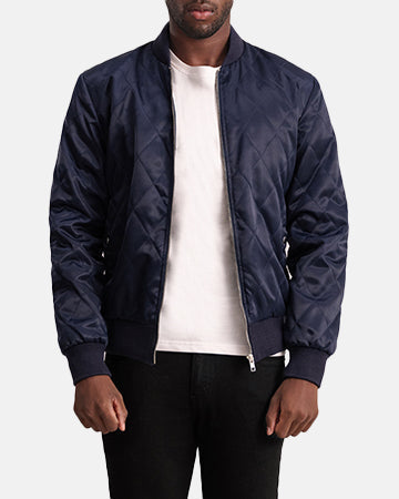 Danson Matelassé Bleu Varsity Veste en Cuir pour Homme - Vue de profil avec coupe de manche ergonomique