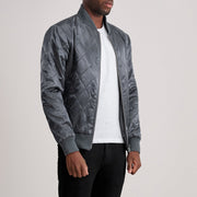 
Grey Satin Varsity Jacket - Vue arrière montrant la carrure ajustée et l'ourlet net