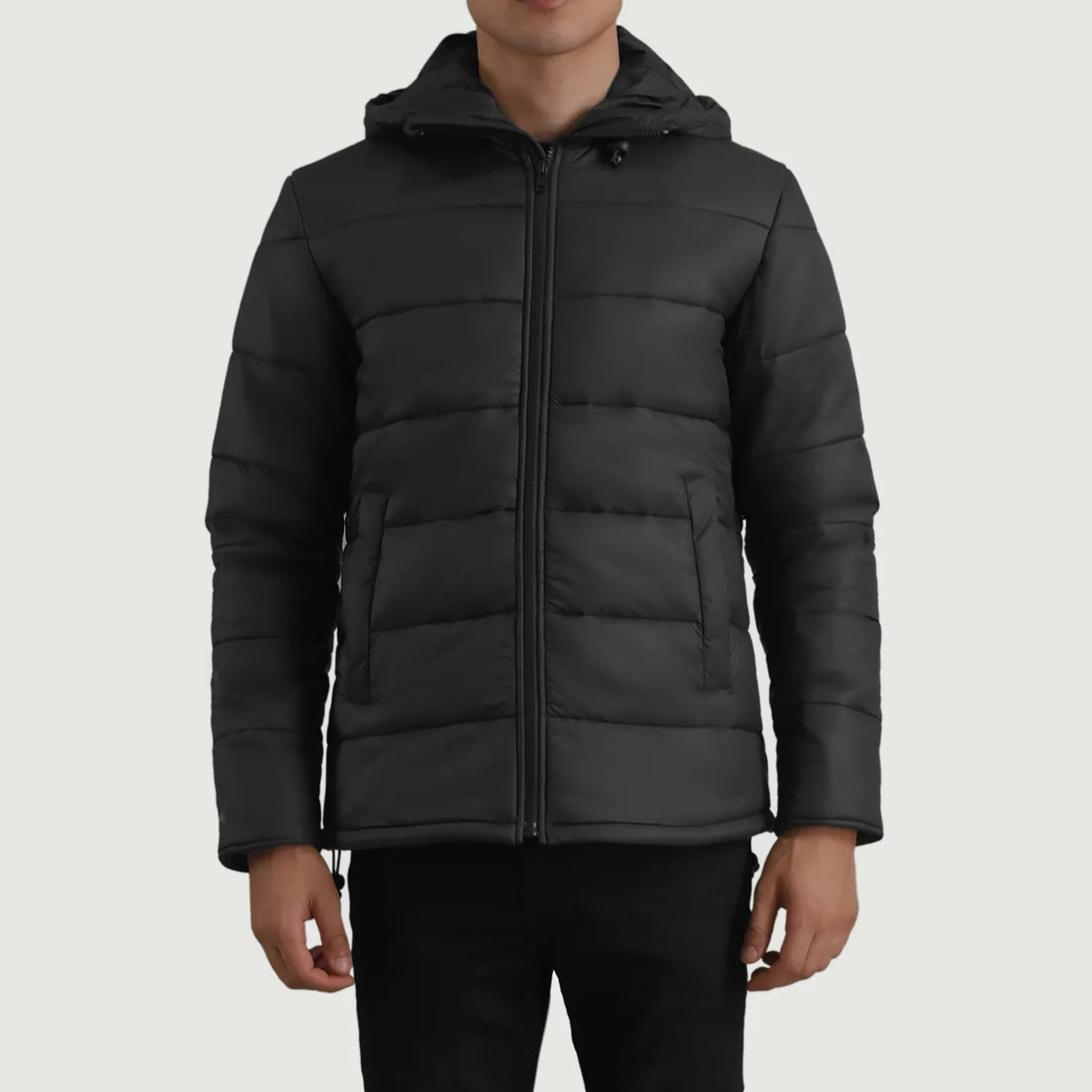 Erico Noir Hooded Puffer Veste en Cuir pour Homme in Black Full-Grain Leather - Vue de face &amp; silhouette ajustée | Acheter en ligne