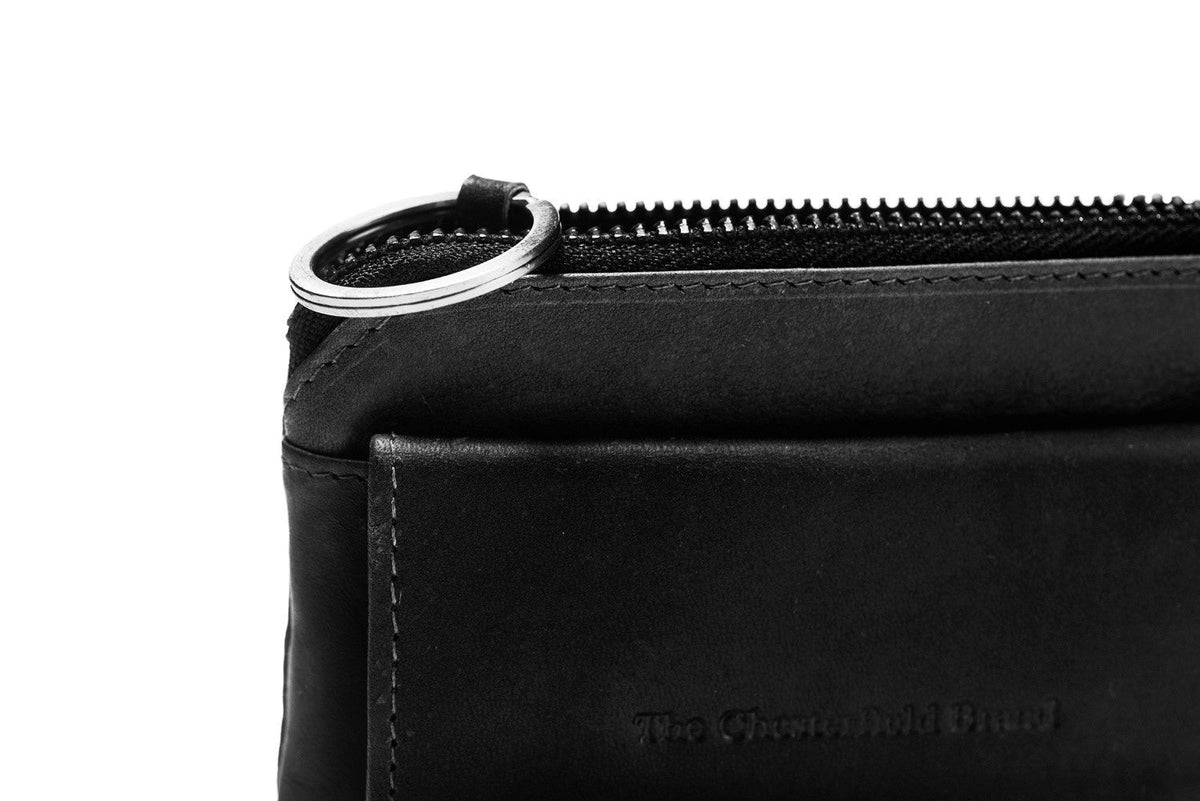 
Oliver Cuir Pleine Fleur Key Case pour Femme - Vue de profil mettant en valeur la coupe de manche ergonomique
