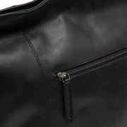 
Zira Sac bandoulière en cuir pleine fleur - Profil latéral structuré montrant la profondeur du soufflet