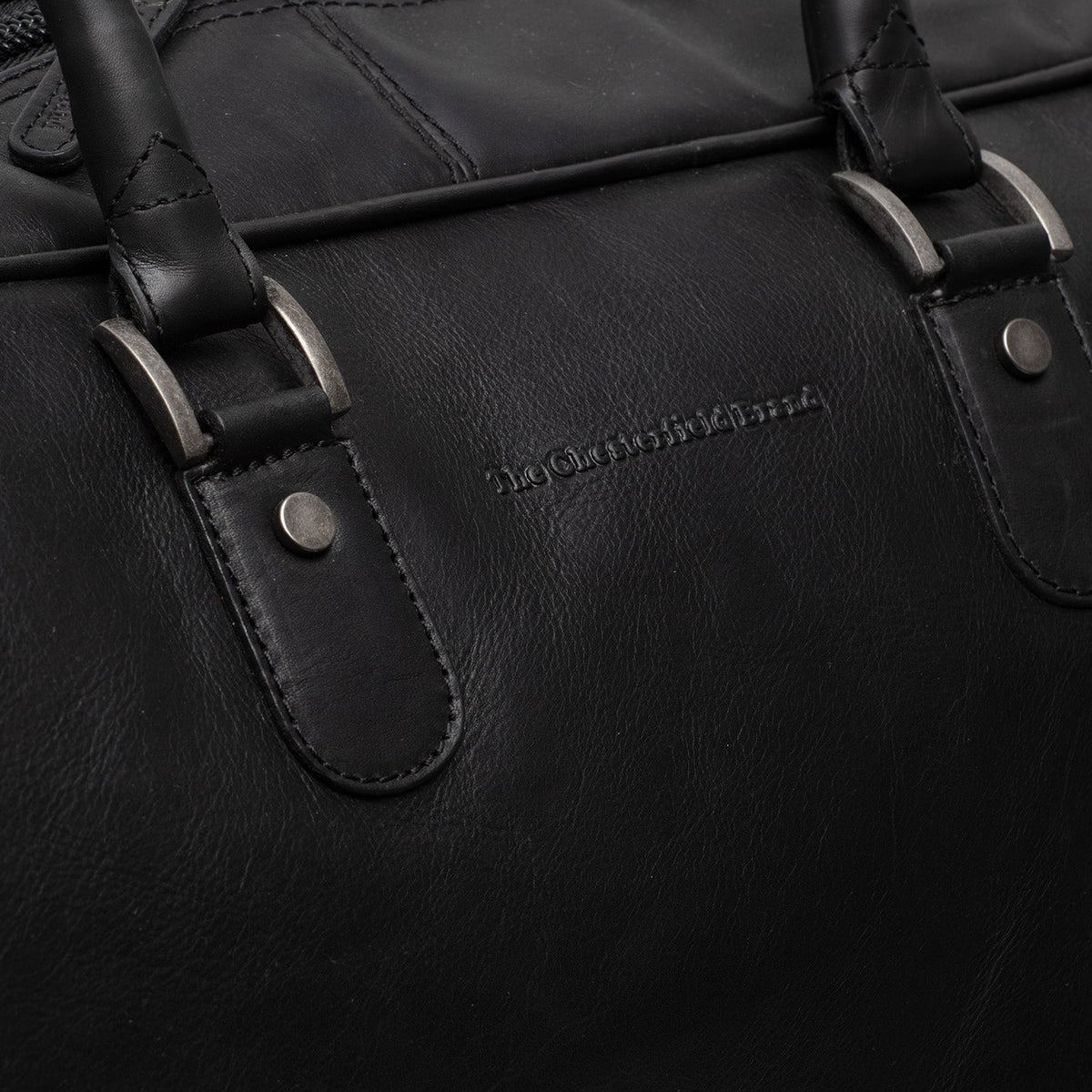 Reinforced Leather Base with Protective Metal Studs Detail