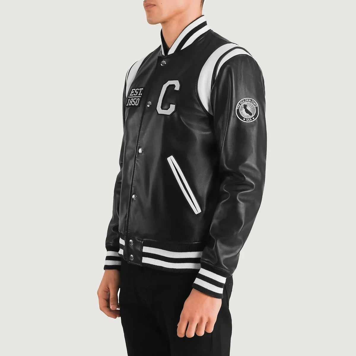 
Black & White Sheepskin Leather Varsity Jacket - Vue arrière montrant la carrure ajustée et l'ourlet net